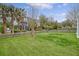 Expansive backyard with lush green grass and a charming wooden fence, perfect for outdoor activities and relaxation at 303 S Ladd Ct, Charleston, SC 29492