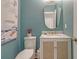 Elegant powder room with stylish vanity, marble countertop, and modern fixtures at 303 S Ladd Ct, Charleston, SC 29492