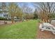 Community green space with picnic tables, offering a shared area for outdoor gatherings and relaxation at 303 S Ladd Ct, Charleston, SC 29492