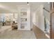 Bright hallway with hardwood floors, modern decor, and seamless flow to the living areas at 303 S Ladd Ct, Charleston, SC 29492