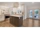 Contemporary kitchen featuring a center island, stainless steel appliances, and hardwood floors at 303 S Ladd Ct, Charleston, SC 29492