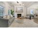 Cozy living room features a fireplace, modern decor, and comfortable seating at 303 S Ladd Ct, Charleston, SC 29492