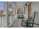 Inviting front porch features rocking chairs, a bench, and a relaxed atmosphere at 303 S Ladd Ct, Charleston, SC 29492