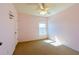 This bedroom is bright and airy, with a ceiling fan and natural light at 309 Peters Creek Dr, Summerville, SC 29486