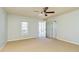 Bedroom with ceiling fan and direct access to outdoor balcony and additional closet space at 309 Peters Creek Dr, Summerville, SC 29486
