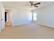 Spacious bedroom with carpet, neutral walls, a ceiling fan, and ample natural light at 309 Peters Creek Dr, Summerville, SC 29486