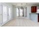 Bright breakfast area featuring patio doors and a modern light fixture at 309 Peters Creek Dr, Summerville, SC 29486