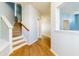Hardwood floors and stairs leading to the second floor at 309 Peters Creek Dr, Summerville, SC 29486
