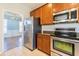 Kitchen with stainless steel appliances and granite countertops at 309 Peters Creek Dr, Summerville, SC 29486