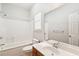 Bright bathroom featuring a vanity, toilet, and bathtub/shower combination at 328 Fern House Walk, Mount Pleasant, SC 29464
