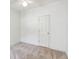 Bright bedroom featuring a door, neutral carpet and a ceiling fan at 328 Fern House Walk, Mount Pleasant, SC 29464