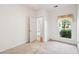 Bright bedroom featuring neutral carpet, a window, and passage to another room at 328 Fern House Walk, Mount Pleasant, SC 29464