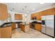 Bright kitchen boasts stainless steel appliances, central island, and granite countertops at 328 Fern House Walk, Mount Pleasant, SC 29464