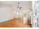 Spacious living room featuring hardwood floors, a fireplace, and an open floor plan at 328 Fern House Walk, Mount Pleasant, SC 29464