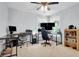 Spacious bedroom setup with multiple computer stations and natural light, ideal for a home office or gaming at 352 Clayton Dr, Charleston, SC 29414