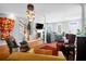 Spacious living room with hardwood floors, ceiling fan, fireplace and mounted TV at 352 Clayton Dr, Charleston, SC 29414