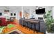 Comfortable living room with ceiling fan, fireplace and a stairway with white painted banisters at 352 Clayton Dr, Charleston, SC 29414