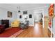 Bright living room featuring hardwood flooring, fireplace and views to the stairwell at 352 Clayton Dr, Charleston, SC 29414