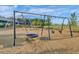 Community playground featuring swings and climbing structure at 366 Trailmore Ln, Summerville, SC 29486
