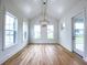 Dining area with many windows and light walls create a bright, airy atmosphere for Gathering meals and gatherings at 3894 Summerton St, Mount Pleasant, SC 29466