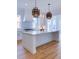 Well-lit kitchen featuring a large island and modern pendant lighting at 3894 Summerton St, Mount Pleasant, SC 29466