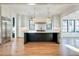 Open-concept kitchen featuring a large center island, stainless steel appliances, and abundant natural light at 3894 Summerton St, Mount Pleasant, SC 29466