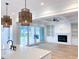Open-concept living space with a fireplace, built-ins, and access to an outdoor area, great for entertaining at 3894 Summerton St, Mount Pleasant, SC 29466