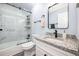 Modern bathroom with a tub-shower combo and a stylish vanity with a granite countertop at 402 Woodward Blvd, Summerville, SC 29483