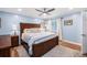 Comfortable bedroom featuring a ceiling fan, area rug, and light blue walls at 402 Woodward Blvd, Summerville, SC 29483