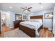 Comfortable primary bedroom featuring a ceiling fan, dark wood accents, and light blue walls at 402 Woodward Blvd, Summerville, SC 29483