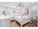 Bright bedroom with a four poster bed, a ceiling fan, and neutral walls at 402 Woodward Blvd, Summerville, SC 29483