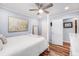 Bright bedroom featuring a four poster bed, a ceiling fan, and neutral colored walls at 402 Woodward Blvd, Summerville, SC 29483