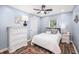 Cozy bedroom featuring a double bed, side tables, and a light blue painted walls at 402 Woodward Blvd, Summerville, SC 29483