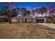 Charming home with a gray front door, inviting porch, and a well-maintained lawn at 402 Woodward Blvd, Summerville, SC 29483