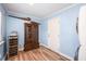 Well lit laundry room with a wine fridge and cabinet storage space at 402 Woodward Blvd, Summerville, SC 29483