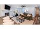 Inviting living area features fireplace, comfortable seating, and wood laminate flooring at 402 Woodward Blvd, Summerville, SC 29483