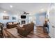 Cozy living room boasts a fireplace, comfortable seating, and lots of natural light at 402 Woodward Blvd, Summerville, SC 29483