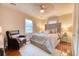 Comfortable bedroom with a plush bed, soft lighting, and a cozy chair at 406 Annette Dr, Goose Creek, SC 29445