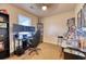 Spacious bedroom featuring hardwood floors, natural lighting, and a dedicated gaming setup at 406 Annette Dr, Goose Creek, SC 29445