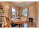 Charming dining room with hardwood floors, a round table, and natural light at 406 Annette Dr, Goose Creek, SC 29445