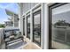 Cozy balcony with seating offers an inviting outdoor space, perfect for relaxation and entertaining at 4414 Avery Ave, North Charleston, SC 29405