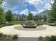 Inviting community common area featuring bench seating and lush landscaping at 4414 Avery Ave, North Charleston, SC 29405