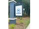 Community entrance sign with 'M' logo and 'Mixon' in blue lettering, with a well-maintained landscape at 4414 Avery Ave, North Charleston, SC 29405