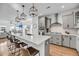 Modern kitchen features a large island, sleek countertops, and stainless steel appliances at 4414 Avery Ave, North Charleston, SC 29405