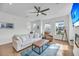 Comfortable living room features hardwood floors, neutral decor, and natural light at 4414 Avery Ave, North Charleston, SC 29405