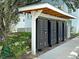 Community mailboxes in a convenient location; landscaped for curb appeal at 4414 Avery Ave, North Charleston, SC 29405