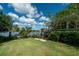 Scenic backyard with lush lawn, staircase, and waterfront views at 4940 Lambs Road Rd, North Charleston, SC 29418