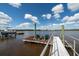 View of private dock with chairs, offering a serene spot to enjoy the waterfront at 4940 Lambs Road Rd, North Charleston, SC 29418