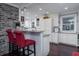 Open kitchen featuring a breakfast bar, granite countertops, stainless appliances and barstool seating at 4940 Lambs Road Rd, North Charleston, SC 29418