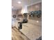 Bright kitchen with granite countertops, stainless steel appliances, and modern lighting at 4940 Lambs Road Rd, North Charleston, SC 29418